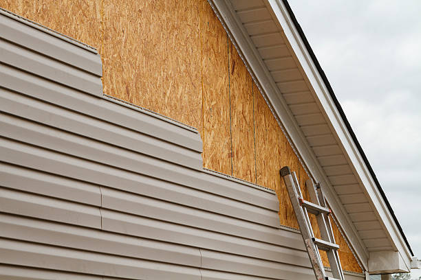 Professional Siding Repair technician working in Marbury, MD